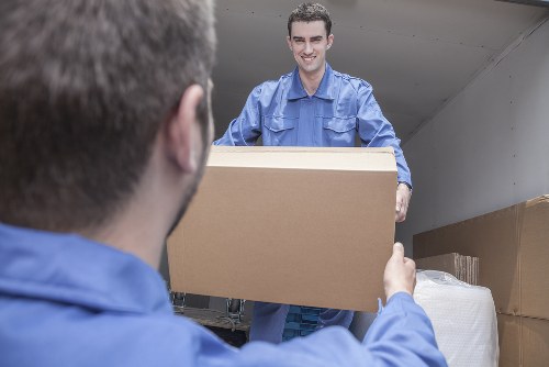 Small moving van loading boxes for a flat move in Acton