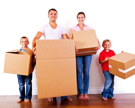Packing and labelled boxes prepared for a business move in Acton