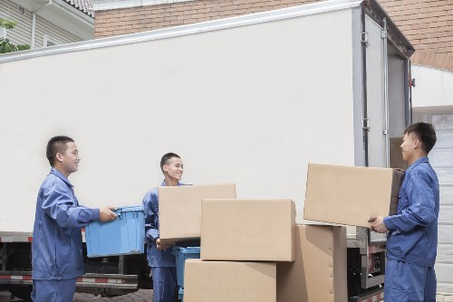 Commercial moving truck parked for an office relocation in Acton