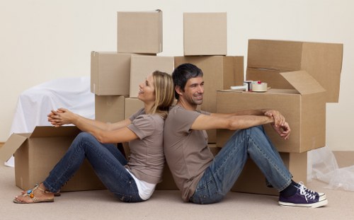 Furniture pick-up service for a home in Acton with bulky items ready for removal