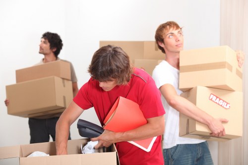 Careful loading of sofas and large items for Acton removals