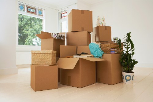 Careful furniture wrapping and loading for a local Acton home move