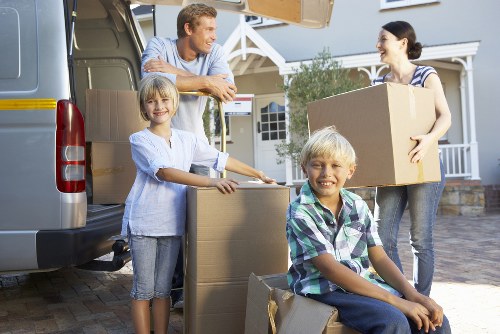 Professional Acton man and van team handling belongings carefully