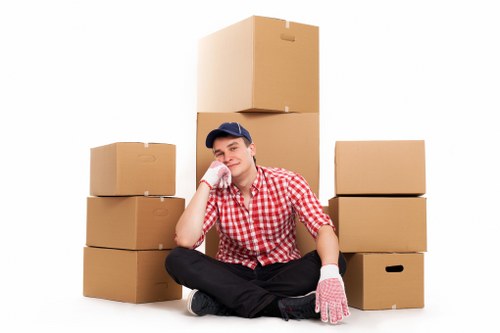 Packed boxes and furniture prepared for storage in Acton